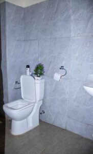 Modern bathroom inside a furnished studio apartment at The Moon Serenity Ruaka Nairobi