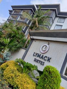 Entrance area of Lymack Suites furnished apartments at Fourways Junction Kiambu Road Nairobi by The Moon Serenity showing modern exterior and secure access