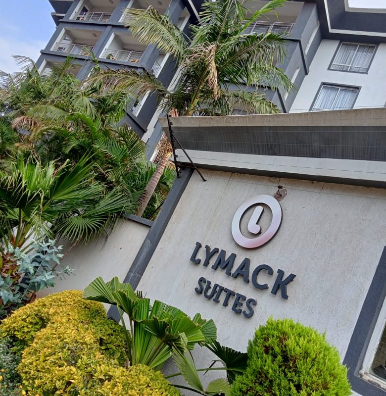 Entrance area of Lymack Suites furnished apartments at Fourways Junction Kiambu Road Nairobi by The Moon Serenity showing modern exterior and secure access