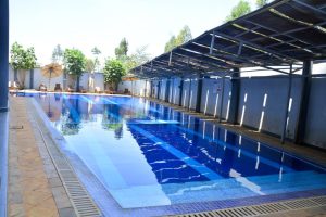 Outdoor swimming pool in The Moon Serenity Furnished Apartment at Lymack Suites in Fourways Junction