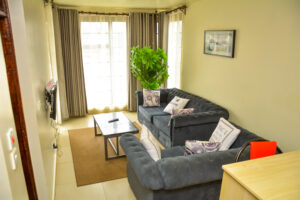 Spacious 2 bedroom furnished apartment interior at The Moon Serenity Furnished Apartments in Ruaka with modern amenities and comfortable living spaces