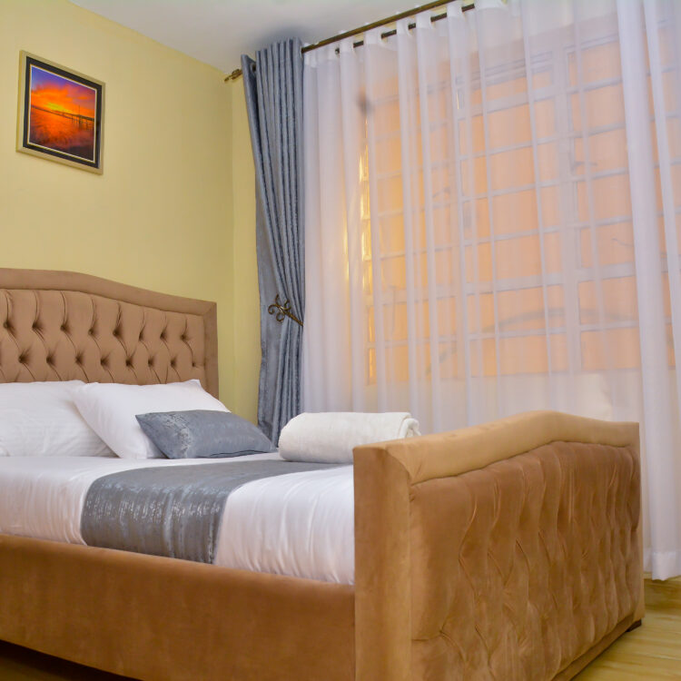 Elegant bedroom at The Moon Serenity Kalwani furnished apartment in Nairobi