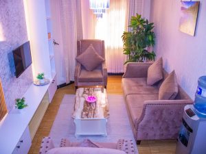 Spacious modern living room at The Moon Serenity Furnished Apartments Thindigua at Kalwani Park featuring elegant furniture, natural lighting, and executive furnished apartment décor near Kiambu Road.