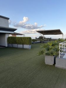Rooftop terrace with artificial turf and panoramic views at The Moon Serenity Fourways Branch Off Kiambu Road, Nairobi.