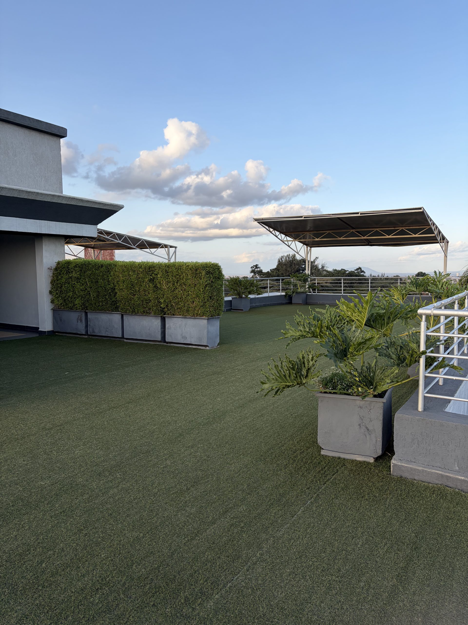 Rooftop terrace with artificial turf and panoramic views at The Moon Serenity Fourways Branch Off Kiambu Road, Nairobi.